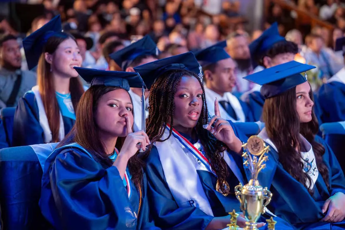 Saint Paul graduates celebrating together at commencement